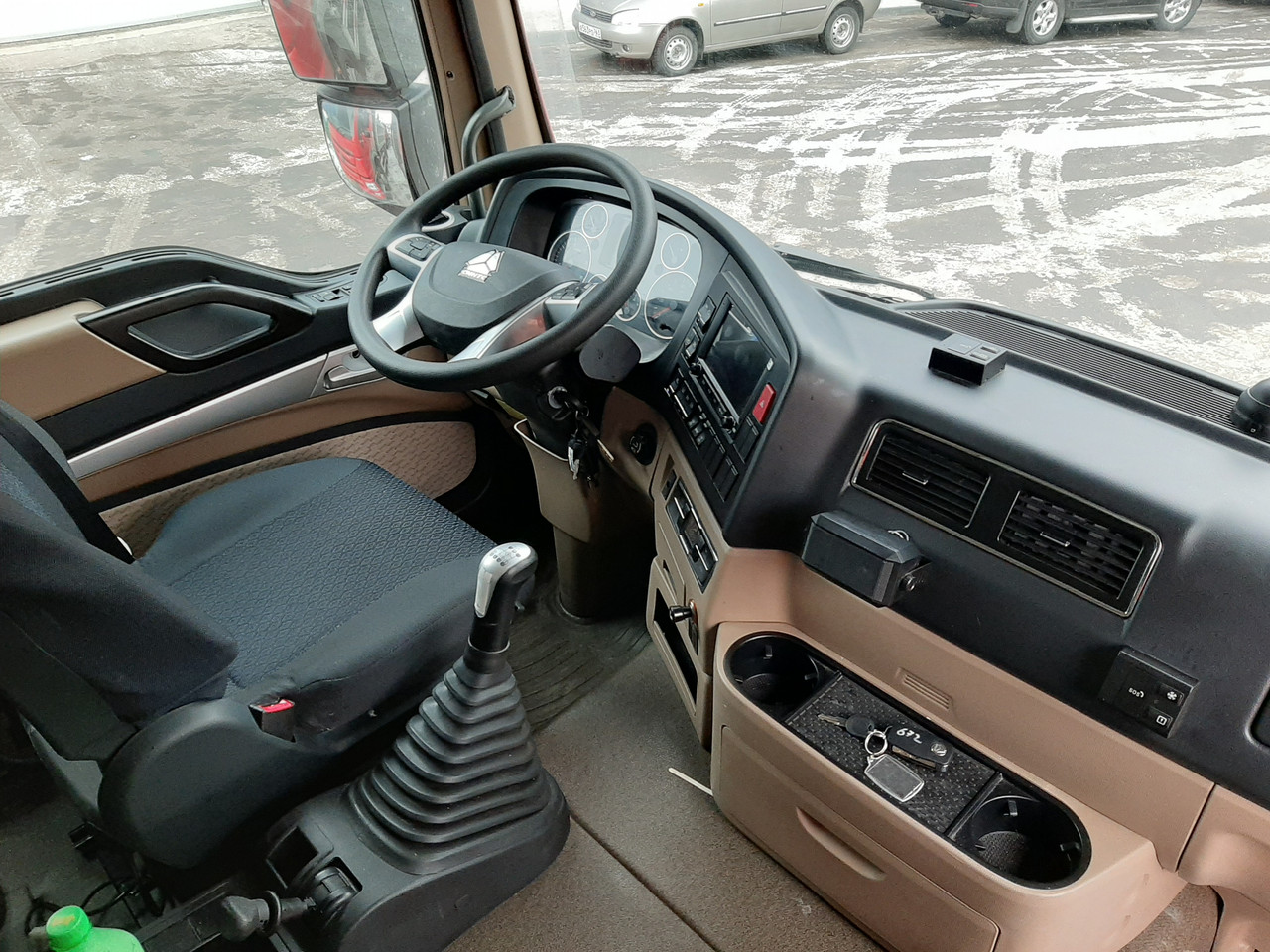Howo-T5G 8x4 - 32 т / 26 куб.м Sunhunk